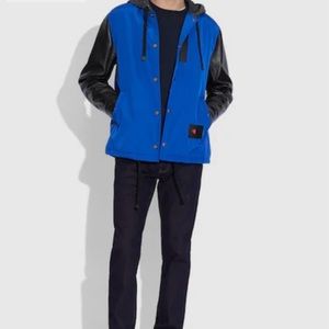 NWT Coach collab with Champion men’s blue and black hoodie jacket. Retails 795$